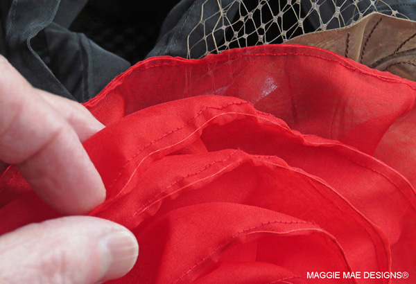 Large red silk organza rose curl trim for the "Big Brown" hat for Old Friends