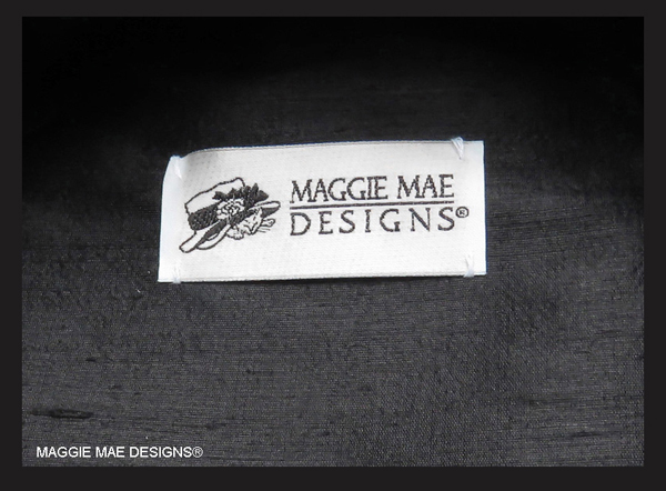 Black dupioni silk lining on the "Cozmic One" hat by MAGGIE MAE DESIGNS