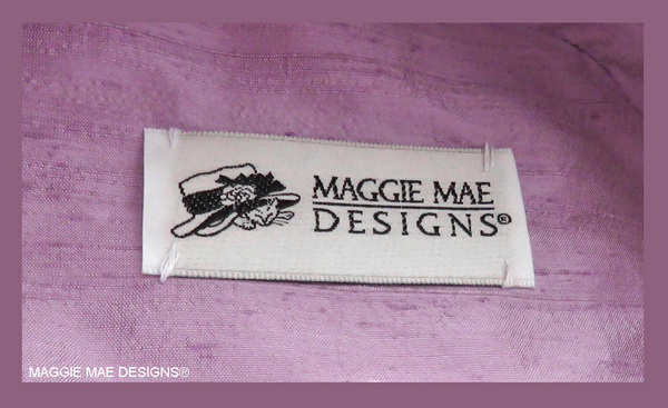 A dusty lavender dupioni silk was used to create the lining for the "I'll Have Another" hat