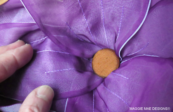 Chocolate silk-covered button trim on the "I'll Have Another" hat
