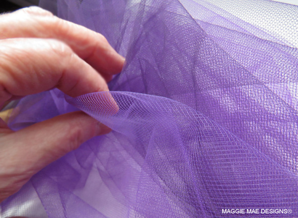 Yards of lavender and plum-purple tulle were used for the "I'll Have Another" hat