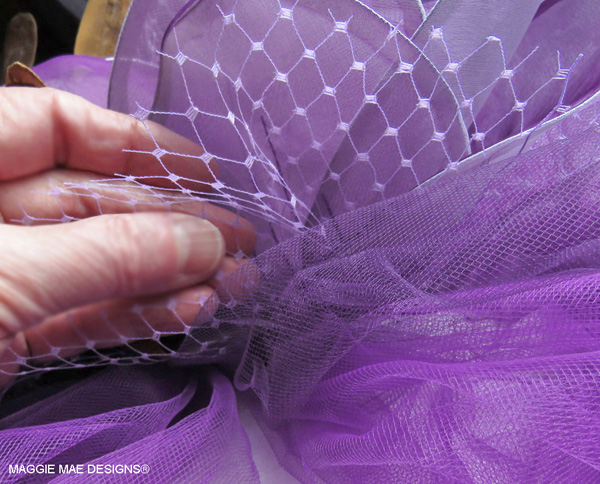 Lavender hat veiling accent on the "I'll Have Another" hat trim