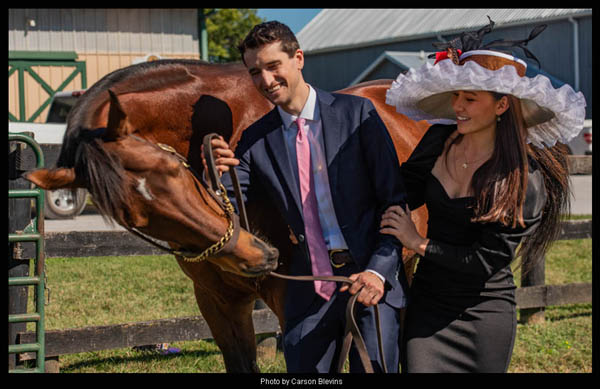 Big Brown with the "Big Brown" Derby hat modeled by Andie Biancone with jockey Keith Asmussen.